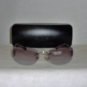B. New Calvin Klein Silver Sunglasses: Mod. 415S & Case