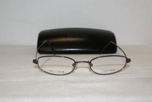 B. New Calvin Klein Eyeglasses: Mod. 557 (005) & Case