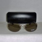B. New Calvin Klein Gold Sunglasses: Mod. 415S & Case