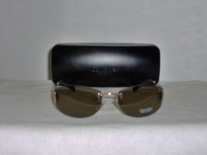 B. New Calvin Klein Gold Sunglasses: Mod. 415S & Case