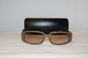 B. New Calvin Klein Brown Sunglasses Mod. 685S & Case