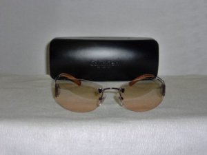 B. New Calvin Klein Bronze Sunglasses: Mod. 415S & Case