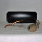 B. New Calvin Klein Bronze Sunglasses: Mod. 415S & Case