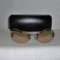 B. New Calvin Klein Bronze Sunglasses: Mod. 415S & Case