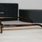 Brand New Prada Brown Eyeglasses: Mod. VPR 08N (7JQ-1O1) 55-18 & Case