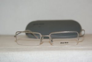 Brand New Miu Miu Shiny Silver Eyeglasses: Mod. VMU 66A (1AP-1O1) 51-19 & Case
