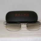 B. New Ralph by Ralph Lauren Sunglasses: 7555 & Case