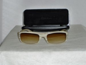 Brand New Calvin Klein Beige Sunglasses: 4046 & Case