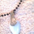 White Cats Eye Glass Pendant on Black Bead Necklace with Vintage Silver Bail