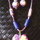 Retro BOHO Chic Rubber Purple Multi Color Necklace & Earring Set on Purple Suede
