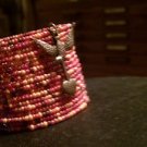 The Hunger Games  Inspired Bali Style Girl On Fire Bead Cuff Bracelet