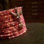 The Hunger Games  Inspired Bali Style Girl On Fire Bead Cuff Bracelet