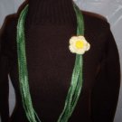 Handmade Infinity scarf/ necklace in multi greens with a yellow flower