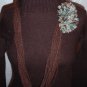Handmade Infinity scarf/ necklace in a two tones of brown  with a large multi colored pom-pom