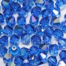 24 pcs Swarovski Crystal 5301 Bicone 6mm Beads CAPRI BLUE AB
