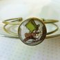 A mad hatter Adjustable bracelet bangle (from Alice in Wonderland)