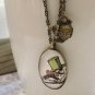 A mad tea party double strand necklace