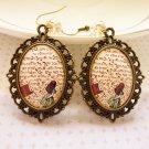 Nowonder Wonderland Earrings (from Alice in Wonderland)