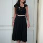 Black chic dress with a twist SIZE S or L