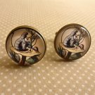 Blue caterpillar cufflinks (from Alice in Wonderland)