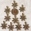 CUTE LOT OF 10 SILVERTONE SNOW FLAKE CHARMS-LEAD FREE GREAT FOR MAKING JEWELRY