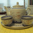 TEA SET INCLUDES 4 CUPS, TEAPOT AND PLATTER