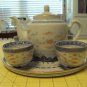 TEA SET INCLUDES 4 CUPS, TEAPOT AND PLATTER