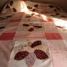 full size floral applique quilt.