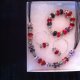 red bracelets and necklaces