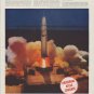 1958 Universal Atlas Cements Ad "To backstop a rochet's blast"
