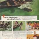 1951 Canadian Club Ad "Roping this man-eater"