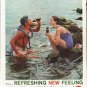 1961 Coca-Cola Ad "What a Refreshing New Feeling"