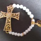 white cross bracelet