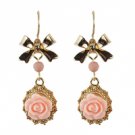 Star's Dazzle Pick Rose and Bow Dangle Earrings