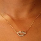 KISS (gold w/ matching earings)
