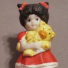 Red Dressed Little Girl with Teddy Bear