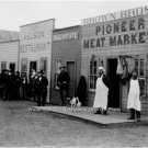 OKLAHOMA WESTERN STOREFRONTS BLACK & WHITE PHOTO 1894 SALOON REAL ESTATE BUTCHER