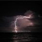 BEAUTIFUL LIGHTNING STRIKE OVER OCEAN COLOR PHOTO CLOUDS WAVES NATURES FORCE