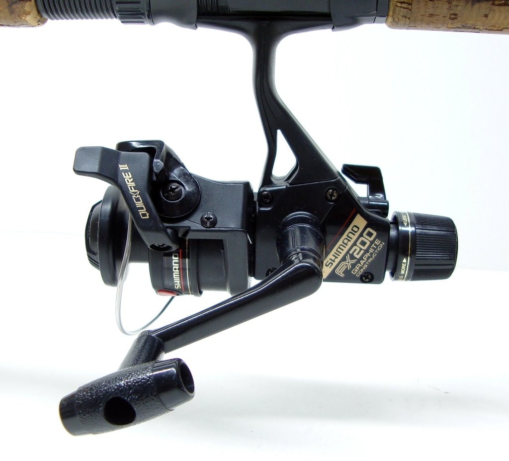 Shimano FX200 QuickFire2 Fishing Reel ( very clean)