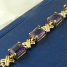 10Kt Yellow Gold 7” Bracelet  with 11 Amethyst Gemstones.