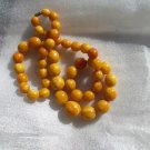 Egg yolk Baltic amber 27 in necklace, 80 gr