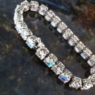 Kirks Folly Gorgeous Crystal AB Aurora Borealis Silver And Gold Tone Bracelet