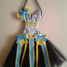 Black, yellow and turquois animal print bow holder