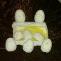 ceramic bisque U paint Dona egg carton + 8 noggin w/hands and feet+ pipe cleaner