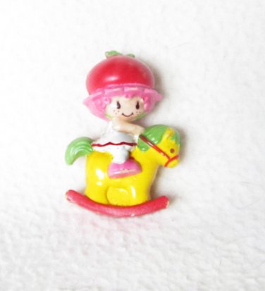 1982 Strawberry Shortcake Cherry Cuddler On A Rocking Horse Figurine
