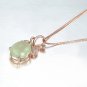 Natural 7.8ct Prehnite pendant and 18K rose gold surround with natural diamond pendant