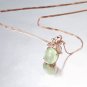 Natural 7.8ct Prehnite pendant and 18K rose gold surround with natural diamond pendant