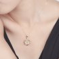 Natural 6.58ct Prehnite pendant and 18K rose gold surround with natural diamond pendant