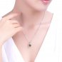 Natural 3.65ct Prehnite pendant and 18K white gold surround with natural diamond pendant