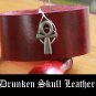 Deep red leather cuff with Ankh concho